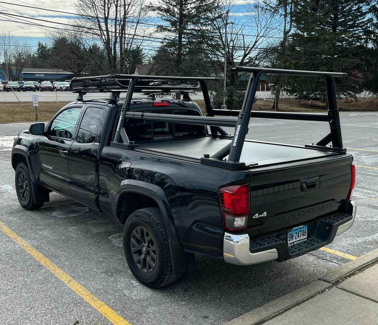 Yakima Overhaul vs Truxedo Elevate: Sport Ladder Rack Product Comparison